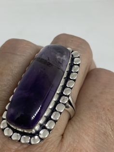 Large genuine amethyst Vintage ring Low content silver not sterling. Size 8 Can be resized by my jeweler for $15-$20 All rings are shipped free in the US in a nice gift box. Check out our over a THOUSAND great reviews Engraving is $4 per letter and is not always perfect depending on the piece. It can take a few days if the jeweler is busy. This is payable to Paypal Judithsltd@gmail.com Sterling Silver Amethyst Ring Gift, Gift Amethyst Ring Hallmarked, Gift Hallmarked Amethyst Ring, Formal Amethyst Ring Stamped 925, Unique Amethyst Ring Stamped 925, Purple Amethyst Ring Stamped 925 For Gift, Purple Amethyst Ring Stamped 925 As A Gift, Unique 925 Stamped Amethyst Ring, Unique Amethyst Ring With Large Stone For Anniversary