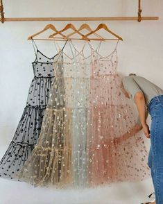 Spring Sequin Tulle Mini Dress, Sleeveless Tulle Skirt Mini Dress For Summer, Summer Tulle Dress With Sequins, Summer Tulle Skirt Mini Dress For Night Out, Summer Sequin Tulle Dress, Sleeveless Star Print Party Dress, Spring Dresses With Spaghetti Straps And Tulle Skirt, Sleeveless Star Print Dress For Night Out, Sleeveless Tulle Dress For Party Season