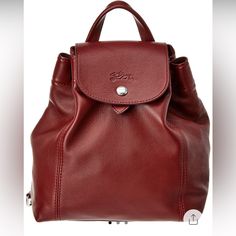 Longchamp Le Pliage Cuir Leather Backpack. Color: Red Lacquer. See Picture For Description And Sizing Information. Discontinued Style. Brand New And Has Dust Bag. Classic Red Backpack For Daily Use, Classic Red Leather Backpack, Classic Formal Backpack With Dust Bag, Classic Red Backpack, Classic Red Leather Everyday Backpack, Classic Red Leather Backpack For Everyday, Classic Formal Backpack With Removable Pouch, Luxury Red Leather Backpack, Luxury Red Backpack For Travel