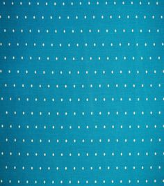 a blue background with white polka dots