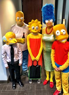 the simpsons family costumed up for halloween