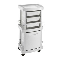 a white cart with three drawers on wheels