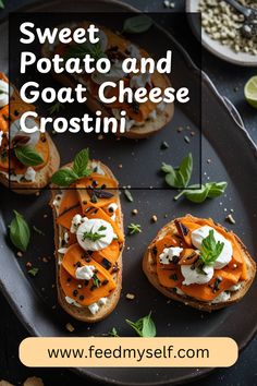 sweet potato and goat cheese crostini on a black plate with basil garnish