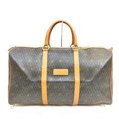 Travel In Style With This Vintage Christian Dior Travel Bag, Featuring The Iconic Dior Monogram Canvas In A Sophisticated Gray Tone, Complemented By Durable Leather Trim. The Bag Is Spacious, Perfect For All Your Essentials, And Comes With Sturdy Leather Handles For Easy Carrying. Details: Material: Gray Dior Monogram Canvas With Leather Trim Size: 22" W X 12" H X 10" D Interior: Includes A Zip Pocket For Secure Storage Condition: Pre-Owned With Minor Signs Of Wear. The Overall In Excellent Cond Dior Travel Bag, Dior Monogram, Dior Vintage, Vintage Christian Dior, Travel In Style, Monogram Canvas, Travel Style, Dior Bag, Leather Handle