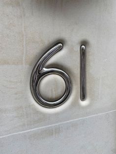 the number six is made up of metal rods