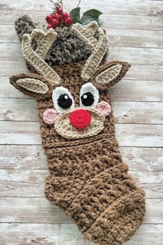 image of a crochet reindeer christmas pattern Crochet Christmas Stocking Pattern, Crochet Stocking, Christmas Crochet Patterns Free, Crocheted Christmas, Crochet Christmas Stocking, Confection Au Crochet, Crochet Xmas, Christmas Stocking Pattern, Handmade Stocking