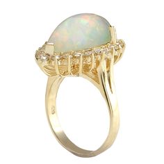 Stamped: 14K Yellow GoldTotal Ring Weight: 5.5 GramsRing Length: N/ARing Width: N/AGemstone Weight: Total Natural Opal Weight is 5.08 Carat (Measures: 17.40x11.04 mm)Color: MulticolorDiamond Weight: Total Natural Diamond Weight is 0.90 CaratColor: F-G, Clarity: VS2-SI1Face Measures: 21.81x16.55 mmSku: [702605W] Formal Oval Cabochon Opal Ring Fine Jewelry, Formal 14k Gold Oval Opal Ring, Elegant 14k Stamped Opal Formal Ring, Gold Multi-stone Opal Ring For Formal Occasions, Formal Yellow Gold Pear-shaped Opal Ring, Pear-shaped Opal Ring For Formal Occasions, Formal Pear-shaped Yellow Gold Opal Ring, Classic Yellow Gold Opal Ring With Accent Stones, Classic Multi-stone Opal Ring For Formal Occasions