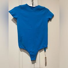 Essential T Shirt Bodysuit In The Color Mykonos (Color Is A Lighter Blue In Person) Size Large/X Large New With Tags Bundle 3 Items Or More And Save 15% Sporty Short Sleeve Bodysuit For Summer, Fitted Blue Crew Neck Swimwear, Fitted Cotton Bodysuit With Crew Neck, Fitted Blue Swimwear With Crew Neck, Blue Fitted Cotton Short Sleeve Bodysuit, Fitted Short Sleeve Athleisure Bodysuit, Blue Casual Short Sleeve Bodysuit For Summer, Casual Blue Short Sleeve Bodysuit For Summer, Casual Blue Crew Neck Swimwear