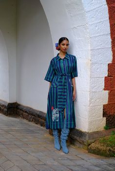 Did someone say chic? Our Javitri dress has an oversized, shirt-style silhouette and a tie up belt to cinch in your waist. It has a structured vibe with its boxy sleeves,and quirky embroidery details. We believe you have a right to know how this product was made. 3.5 metres of south Indian mangalgiri cotton fabric sourced from Jaipur has been used for this piece. Hand printed by our artisans in Jaipur, manufactured in our workshop at Pune, India. This product is hand-printed in Jaipur, India using techniques of traditional hand block printing. Subtle variations in patterns are natural to this process. We believe this makes each creation unique and charming. If you wish to have the length of the garment altered, please mention your request in the special instructions section at checkout, wi Multicolor Chanderi Block Print Dress, Chanderi Long Sleeve Block Print Dresses, Multicolor Long Sleeve Dress With Block Print, Semi-stitched Cotton Dresses With Block Print, Jaipur Dresses Block Prints, Xxxl Dress, Dress Stands, Embroidery Details, Ethical Fashion