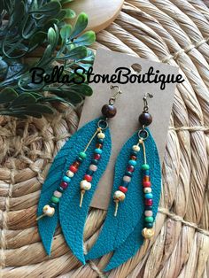 Boho beaded leather teal wing earring/boho leather dangle earring/long leather earring/feather beaded earring Boho shabby chic! Teal beaded wing leather earring.Hand beaded Czech Toho glass beads.Super light and ready to wear! Kona Brian accent wood beads. Antique bronze earrings hooks. Hooks are lead and nickel free .Ready to sell will ship out same or next day in a gift box with tracking:) thanks for looking at my shop:) Recycle Jewelry, Crystal Jewelry Diy, Silk Tassel Necklace, Pig Jewelry, Pig Earrings, Extra Long Earrings, Earring Long