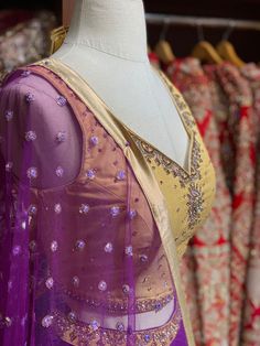 Violet purple skirt paired with contrasting golden zardozi and stone work blouse and net sequins butti dupatta. Fabric: Raw Silk This outfit can be customized in multiple colors and specific to client measurements. 90 days of production time is required and are for bulk orders only! Orders are processed in store only! Final fittings/alterations not included. Minimum Order Quantity- 4 pieces Bridesmaids Lehenga, Stone Work Blouse, Lilac Blouse, Golden Blouse, Bridesmaid Lehenga, Purple Bridesmaids, Purple Skirt, Blouse Work, Violet Purple