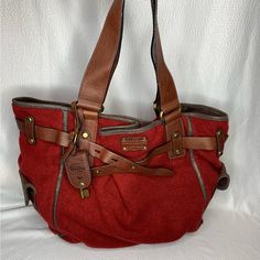 Like New, Never Used Fossil Tote Style Handbag. Deep Red, Flannel Feel Fabric With Brown Leather Handles/Straps And Trim. Brass Tone Hardware, Magnetic Closure, 3 Interior Pockets (1 Zipper, 2 Slip), 2 Small Exterior Pockets. Approx 16” Wide X 11” Tall Smoke And Pet Free Home. Shopping Satchel Shoulder Bag With Strap, Red Casual Shoulder Bag With Handles, Burgundy Casual Bag With Double Handle, Casual Red Shoulder Bag With Handles, Red Tote Bag With Leather Handles, Red Bags With Leather Trim For Everyday Use, Red Double Handle Bag With Adjustable Strap, Casual Red Shoulder Bag, Red Hobo Bag With Leather Handles For Everyday Use