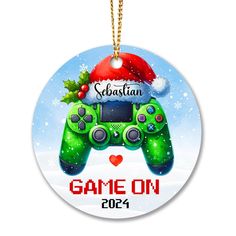 a christmas ornament with a video game controller