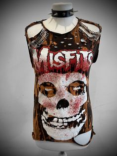 THE STITCHES Distressed Rock collection - This Misfits t-shirt is a handmade bleached crop top/t-shirt made with a brand new officially licensed band shirt. - Distressed Misfits  crop top/shirt - Safety pin unisex hand-made crop/tee - Material: Bleached cotton Measurements - Fit UK 8-12, US4-8 - Width (armpit to armpit) : 18 Inches  - Length (top of collar to bottom): 25 inches Care instructions: - This is a distressed item and will require proper care, it should be washed inside out gently and Safety Pin Shirt, Safety Pins, Band Shirt, Rock Collection, Crop Top Shirts, Cute Diys, Top T Shirt, Band Shirts, Cut Tshirt