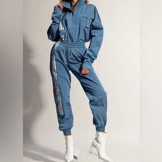 Ivy Park X Adidas Nylon Track Pants ( H33308) New With Tags Size Xs Unisex Color Blue/ White Ivy Park X Adidas Chic Performance Collection The All-Gender Track Pants Offer A ‘90s Style Made From High Gloss Nylon And A Baggy Fit With An Adjustable Drawcord Waist And Ankle Cuffs. Drawcord On Elastic Waist - Side Zip Pockets - Leg Pocket - Back Pocket - Elastic Cuffs - 100% Nylon Plain Weave Fast Shipping Same Or Next Day With Tracking Information Sporty Blue Tracksuit For Spring, Blue Spring Tracksuit Sportswear, Blue Spring Tracksuit For Streetwear, Sporty Spring Tracksuit With Pockets, Blue Sporty Tracksuit With Pockets, Sporty Blue Tracksuit With Pockets, Blue Fitted Tracksuit With Pockets, Fitted Blue Tracksuit With Pockets, Blue Adidas Pants