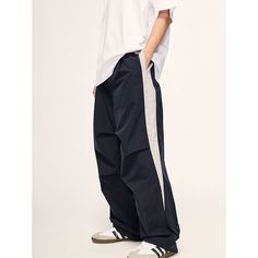 Loose Retro Color-Block Sports Wide-Leg Pants Material: 100%Polyester Size: S, M, L, XL Color: Navy Blue, Purple Applicable Scene: Leisure, Daily, Vacation Casual Bottoms With Contrast Color, Blue Sweatpants With Side Stripes For Streetwear, Blue Sports Sweatpants With Elastic Side Panels, Sporty Blue Joggers With Side Stripes, Blue Sporty Joggers With Side Stripes, Cotton Wide-leg Sports Pants, Casual Sports Bottoms With Contrast Color, Sporty Blue Pants With Elastic Side Panels, Stretch Pants With Contrast Color For Streetwear