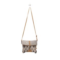 This FOLD OVER stylish cross-body bag offers storage for your tablet and other essentials for a day of traveling or a trek through the urban jungle. The combination of cowhide and honey bee print looks chic. Materials: Canvas, Hairon, Leather, & Rug Measurements:- Depth: 2.5"- Shoulder: 22"- Width: 10.5"- Height: 10.5" Fall Travel Clutch Shoulder Bag, Travel Clutch Flap Bag With Adjustable Strap, Fall Travel Crossbody Shoulder Bag, Fall Travel Shoulder Flap Bag, Fall Travel Flap Shoulder Bag, Crossbody Shoulder Bag With Laptop Sleeve For On-the-go, Laptop Sleeve Crossbody Shoulder Bag For On-the-go, Beige Travel Shoulder Bag With Laptop Sleeve, Travel Shoulder Bag With Laptop Sleeve In Beige