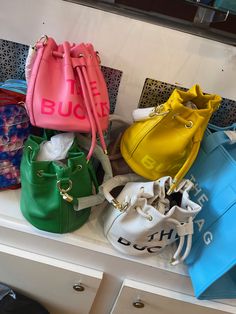 Super soft vegan leather bag. Vibrant colors and quality materials. Woodfield Mall, Vegan Leather Bag, Fjallraven Kanken Backpack, Hot Topic, Phone Numbers, Blue Yellow, Bucket Bag, Pink And Green, Vegan Leather