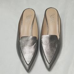 New Without Tags Pointed Toe Slip On Has 1.5" Box Heel. Can Be Paired With A Nice Pair Of Jean's And A Fun White Top.. Silver Slip-on Party Mules, Silver Slip-on Flats With Removable Insole, Elegant Silver Slip-on Heels, Chic Silver Slip-on Flats, Silver Flats For Evening In Summer, Silver Flats For Evening Summer Events, Silver Evening Flats For Summer, Silver Round Toe Flats For Formal Occasions, Silver Leather Flats For Evening