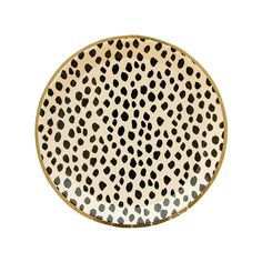 an animal print plate with black spots on it