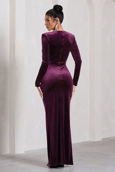 Spice things up this party season in our latest long-sleeved maxi Vin Chaud. Crafted in a premium purple velvet, this floor-sweeper boasts a timeless, sophisticated silhouette made for maximum impact. Featuring a contemporary plunge neckline and twisted knot detail, Vin Chaud is finished with a daring high-leg split. Features - Premium stretch velvet- Wired plunge neckline- Long-sleeved- Shoulder padding - Invisible zip closure - Twisted knot detail - High-leg split- Maxi length Sizing & Fit Model is 5'8" and wears UK size 8 / US size 4 Product Information Designed exclusively by Club L London Partially lined with good stretchPremium velvet in Port (92% Polyester, 8% Elastane)157cm total lengthSKU: CL128789101 Velvet Prom Dress, Velvet Bridesmaid Dresses, Leg Split, Black Dress Prom, Black Tie Gala, Split Maxi Dress, Christmas Party Dress, Bridesmaid Outfit, Black Velvet Dress