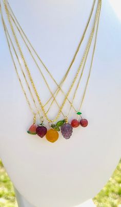 "Mini Crystal Fruit Necklace 14k gold filled sterling silver, made with hand carved agate! Listing is for 1 necklace.  Choose between: 🍓 Red Agate Strawberry 🍇 Amethyst Grape bunch 🍊Orange Agate Orange 🍉Pink Agate Watermelon slice 🍒Pink Agate Cherries 💎Each necklace is handcrafted with carved genuine crystal and 14k yellow gold filled Sterling Silver.  🎁💕Each necklace comes in a pink velvet box, inside of a gold sachet! Ready for gifting to another or to yourself!  ⛓️Chain length is measured from end to end.  Introducing the perfect summer accessory to elevate your cottagecore wardrobe - the Crystal Fruit Necklace! Crafted with care from 14k gold filled sterling silver, these delightful pieces of jewelry are the epitome of charm and style. With crystal shapes resembling juicy straw Handmade 14k Gold Amber Jewelry, Handmade 14k Gold Filled Charm Necklace For Gift, Handmade 14k Gold Filled Charm Necklaces For Gifts, Handmade 14k Gold Filled Charm Necklaces As Gift, 14k Gold Amber Necklace For Gift, Fruit Cottagecore, Cottagecore Necklace, Cherry Jewelry, Crystal Fruit