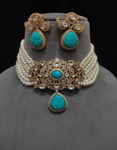 Turquoise Kundan Choker Necklace, a tribute to Sabyasachi's style. This Polki Choker and Jadau Jewelry ensemble exudes opulence, showcasing the allure of Kundan Bridal Jewelry. The Kundan Choker Set celebrates tradition and artistry, reflecting regal charm. Indulge in the resplendent beauty of this jewelry set, where every piece captures the essence of Kundan and Polki craftsmanship, creating a captivating blend of elegance and cultural richness. Please choose The color of Your choose 😊 Customized orders takes 3 to 4 weeks, depending on piece requirements.  The Ombre Designs Jewelry pieces can be customized in accordance with your requirement.  Please Email or Whats app on : +91 8448833193 / sonalikamehra@theombredesigns.com Elegant Turquoise Kundan Necklace For Festive Occasions, Elegant Turquoise Jewelry With Stone Work, Festive Turquoise Jewelry, Traditional Kundan Necklace In Turquoise, Turquoise Meenakari Necklace For Wedding, Festive Turquoise Jewelry For Celebration, Turquoise Necklace For Celebrations And Festivals, Festive Turquoise Jewelry Gift, Traditional Turquoise Necklace For Celebration