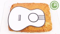 a piece of bread with an image of a guitar on it