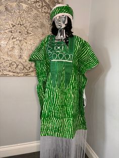 African/Nigeria bubu outfit. One size. Please note measurements: Width: 64inches Arm hole: 20inches Length: 58 Traditional Green Free Size Kaftan, Green Free Size Festival Kaftan, Green Loose Fit Long Kaftan, Green Oversized Long Kaftan, Oversized Green Long Kaftan, Oversized Long Green Kaftan, Traditional Green Short Sleeve Kaftan, Traditional Short Sleeve Green Kaftan, Traditional Green Kaftan With Short Sleeves