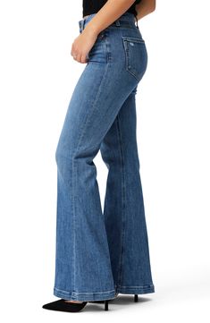 Dramatically flared legs add undeniable '70s boogie to high-rise, full-length jeans cut from vintage-inspired stretch denim in a fading-blue wash. 34 1/2" inseam; 24 1/2" leg opening; 10" front rise Zip fly with button closure Five-pocket style 91% cotton, 7% polyester, 2% spandex Machine wash, line dry Imported Mid-rise Medium Wash Flares For Fall, Mid-rise Denim Blue Flares For Fall, High Rise Denim Flares For Fall, Denim Blue Straight Leg Flares For Fall, Fall Denim Blue Straight Leg Flares, Dark Wash Full-length Flares For Fall, Dark Wash Full Length Flares For Fall, Dark Wash Full Length Fall Flares, Full-length Dark Wash Flares For Fall