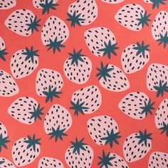 an orange background with black and white strawberries on it's sides, all over