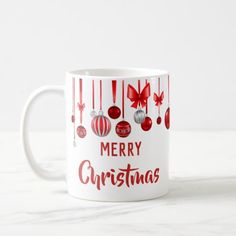 a coffee mug with merry christmas decorations on it