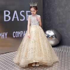 Elegant Embellished Sleeveless Princess Dress, Elegant Sleeveless Embellished Princess Dress, Elegant Sleeveless Sequin Dress For Pageants, Elegant Sleeveless Sequin Dress For Pageant, Elegant Sequin Dress For Pageants, Elegant Sequined Ball Gown For Dress-up, Elegant Sequined Princess Dress For Prom, Elegant Princess Dress With Sequins For Prom, Elegant Gold Princess Dress With Sequins