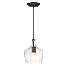 a glass light hanging from the ceiling with a black cord and an orange bulb on it