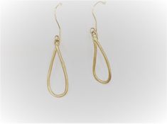 This beautiful 14 Karat Yellow Gold Handmade Tear Drop Earring is all handmade by Carolyn. It features artifact like looks both sides differ from each other. Unique design for stylish women. Total weight of 14K gold is 1.5 grams. Pair of earring Dimensions 25x10mm Can be ordered in rose or white gold. Due to the nature of hadmade products and computer screens, actual product may slightly differ from the one featured in the picture. Classic Handmade Teardrop Hoop Earrings, Handmade Gold Teardrop Earrings, Yellow Gold Teardrop Linear Earrings For Pierced Ears, Elegant Handmade Yellow Gold Teardrop Earrings, Gold Teardrop Pendant Earrings With Ear Wire, Handmade 14k Gold Drop Earrings, Handmade Teardrop 14k Gold Hoop Earrings, 14k Gold Teardrop Linear Earrings For Anniversary, Handmade Teardrop Hoop Earrings For Formal Occasions