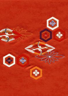 an orange background with different designs and colors on it, including hexagons