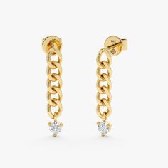 Adorn yourself in modern luxury with our 14k Gold Diamond Dropdown Cuban Chain Earrings. Handmade and featuring brilliant-cut diamonds on a dangly stud, these earrings effortlessly blend classic elegance with contemporary allure, creating a bold statement piece for any occasion. - Handmade - Solid Gold - Natural Diamonds - G Color, SI Quality Diamonds - Total Diamond Carat Weight: 0.20 ctw - Diamond Size: 3 mm - Chain Size: 3.5 mm - Earring Length: 22 mm 🛠 Your Sarah Elise piece is handcrafted White Gold Earrings With Cable Chain For Gift, 14k White Gold Earrings With Cable Chain, Yellow Gold Earrings With Adjustable Chain For Anniversary, Yellow Gold Earrings For Anniversary, 14k Yellow Gold Chain Earrings, Yellow Gold Cable Chain Earrings, Fine Jewelry, Yellow Gold Cable Chain Earrings Fine Jewelry, White Gold Chain Earrings As Gift, White Gold Chain Earrings For Gift