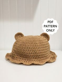 a crocheted bear hat is shown with the text, pattern only on it