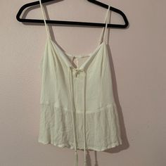 Great For A Party Or Dinner! I’ve Had It For Years But Just Have Never Worn It! So It Doesn’t Have Tags But It Is Practically New!!! Super Cute With Jeans Or A Skirt! Summer V-neck Top With Tassels, Summer V-neck Tops With Tassels, Summer Party Camisole With Tie Straps, Summer Party Tank Top With Tie Back, Beach Crop Top With Tie Straps, Summer Party Cotton Camisole, Casual Party Tank Top With Tie Back, Chic Fringe Tank Top For Summer, Summer Fringe Crop Top For Night Out