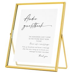 a gold frame holds a white card with the words advice guestbook written on it