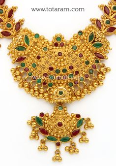 22 karat gold necklace & drop earrings set with rubies & emeralds and intricate workmanship. 
     - 235-GS685 - in 76.650 Grams for USD $8,684.80 USD. 
Made in India by Totaram Jewelers Online this product is in Gold - 22 Karat BIS Hallmark 916 Gold  & is an excellent gift for Adult - Women. Ships fully insured with secured guaranteed delivery for free with your order over $250 from New Jersey USA & comes with 30 days exchange policy. 22k Gold Temple Necklace With Intricate Design For Anniversary, Formal Temple Jewelry Style Gold Emerald Necklace, Gold Emerald Necklace For Formal Festivals, Formal Gold Emerald Temple Jewelry Necklace, Formal Gold Emerald Necklace For Festivals, 22k Yellow Gold Emerald Necklace For Wedding, Festive 22k Gold Emerald Necklace, Ceremonial Hand Set Emerald Necklace In Gold, 22k Gold Emerald Necklace For Festive Occasions