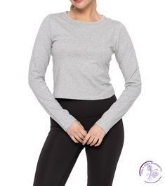 Experience the perfect blend of comfort and style with our Organic Elegance Long Sleeve Top. Made with 100% organic cotton, its soft baby fit scoop neck and wide neckline binding add a touch of elegance to your wardrobe. Feel good and look good with this sustainable fashion choice! Material: 100% Cotton Comfortable Fitted Tops For Fall, Comfortable Fitted Tops For Everyday, Fitted Basic Scoop Neck Top, Fitted Scoop Neck Basic Top, Comfortable Everyday Fitted Tops, Comfortable Fitted Long Sleeve Tops, Fitted Basic Tops For Loungewear, Everyday Athleisure Tops With Thumbholes, Basic Stretch Scoop Neck Top