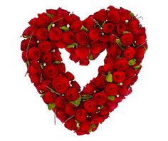 a heart made out of red roses on a white background