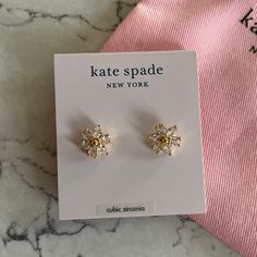 Kate Spade First Bloom Stud Earrings. Made Of Gold Tone Plate Cubic Zirconia With A Titanium Post Back. 3/8 Inch In Diameter, Dainty And Dazzling Customers Illuminate The Cubic Zirconia And Defined The Stud Earrings For Every Day Views. New With Tags. Kate Spade Gold Earrings For Formal Occasions, Kate Spade Gold Earrings For Anniversary, Elegant Gold Kate Spade Jewelry, Kate Spade Dangle Earrings For Gifts, Elegant Pink Kate Spade Earrings, Kate Spade Earrings Stud, Spade Earrings, Kate Spade Earrings, Spade Jewelry