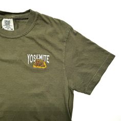 Show your love for the national parks with this heavyweight cotton short sleeve shirt. Embroidery features the Northland's signature Yosemite Nation Park design. Color: Olive Green Size: Embroidery is 3" wide. Size pictured is a small (see last photo for size chart) Materials: 6.1 oz, 100% ring spun preshrunk cotton (Comfort Colors) Cotton T-shirt For Hiking With Short Sleeves, Green Cotton T-shirt For Hiking, Cotton Camp Shirt For Outdoor Activities, Cotton Camp Shirt With Short Sleeves For Outdoor Activities, Cotton Short Sleeve Camp Shirt For Outdoor Activities, Pre-shrunk Short Sleeve Camp Shirt For Hiking, Park Design, Parking Design, Shirt Embroidery