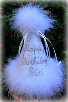 THIS IS A SOLID WHITE BEAUTIFUL HAT WITH SILVER METALLIC WRITING, the lighting was really bad, it is really an adorable hat in person! This listing is for a Boutique quality Monogrammed Birthday Hat for your little sweetie, boy or girl. These are excellant quality, padded, covered, and the embroidered with your choice of colors! Your little doll will be the hit of the party, you can't get anymore original than this. Super for a keepsake for years to come! There are lots of hats out there, but no New Years Birthday Party, Bday Hat, Baby Birthday Hat, New Years Birthday, Birthday Chair, Conical Hat, First Birthday Hat, 1st Birthday Hats, Birthday Hats