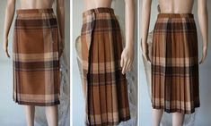 Vintage Tartan Skirt Ladies  Plaid Skirt Small Size > 60% Acryl, 35% Polyester, 5% Other fibres > Unlined > Color : brown, beige, blue NOTE. Actual colors may vary. This is due to the fact that each monitor has different possibilities for displaying colors, and everyone sees these colors in their own way. PLEASE, look the actual measurements in description which are taken by hand and thus show the actual size. Great  vintage condition Measurements  (laying flat) : Length : 58 cm / 22.8'' Waist : Brown Fitted Pleated Skirt With Lining, Fitted Lined Brown Pleated Skirt, Fitted Brown Pleated Skirt Bottoms, Fitted Brown Pleated Skirt, Casual Brown Pleated Midi Skirt, Vintage Brown Skirt, Brown Vintage Skirt, Brown Lined Mini Pleated Skirt, Brown Mini Pleated Lined Skirt