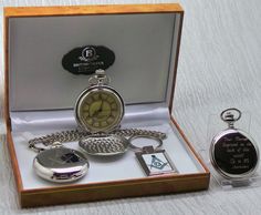 A stunning gift set - Beautifully presented in a luxury case and ribbon-wrapped - Fully branded by the British Silver Company Full Hunter Pocket Watch operated by Quartz / Battery and includes an attractive pocket chain. A reliable and accurate timepiece Also includes a sturdy, well crafted Masonic keyring also clad in silver. All in all a most attractive set and only available in very limited numbers. We will add a custom engraved message on the back of the watch but you must add a note to your Luxury Gift Set, Masonic Ring, Custom Engraving, Pocket Watch, Ring Shopping, Gift Set, Personalized Gifts, Jewelry Watches, Unique Items Products