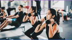 a group of people working out in a gym