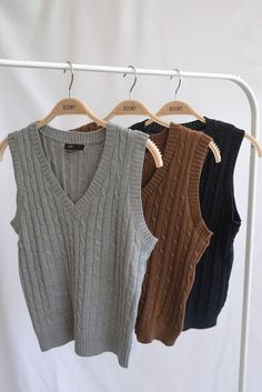 A woven sleeveless knit sweater vest featuring cable-knit stitching Indie Outfits Men, Brown Sweater Vest, Amazing Crochet, Crochet Sweaters, Knit Sweater Vest, Cardigan Style, Austin Butler, Muslimah Fashion Outfits, Sleeveless Knit